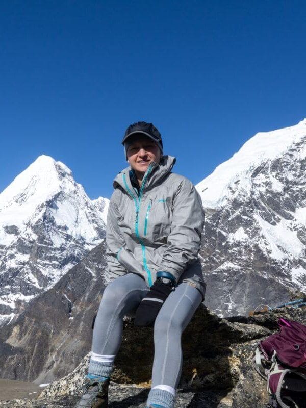Trekker resting with Himalayan views during the Makalu Base Camp Trek
