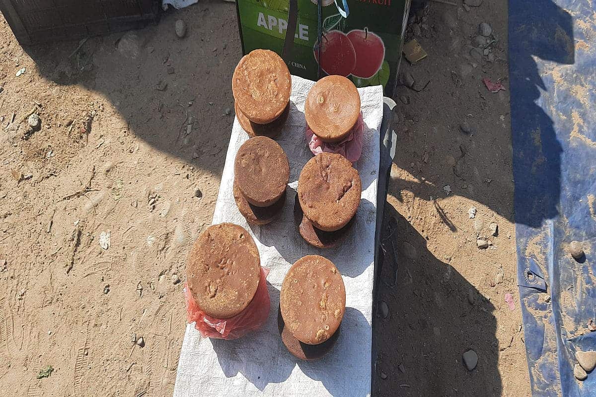 Locally produced brown sugar (Sakhar) on display for sale during a community trek in Nepal