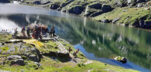 Pilgrims gathered at the shores of the sacred Sabha Pokhari Lake during the Sabha Pokhari Trek in eastern Nepal
