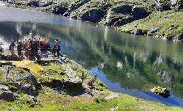 Pilgrims gathered at the shores of the sacred Sabha Pokhari Lake during the Sabha Pokhari Trek in eastern Nepal