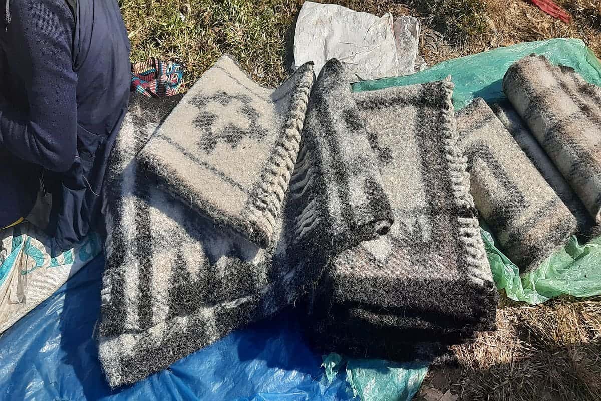 Traditional sheep wool blankets displayed as local products in Nepal.