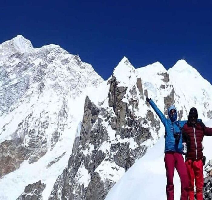 Guest with a local porter guide at Mt Makalu.