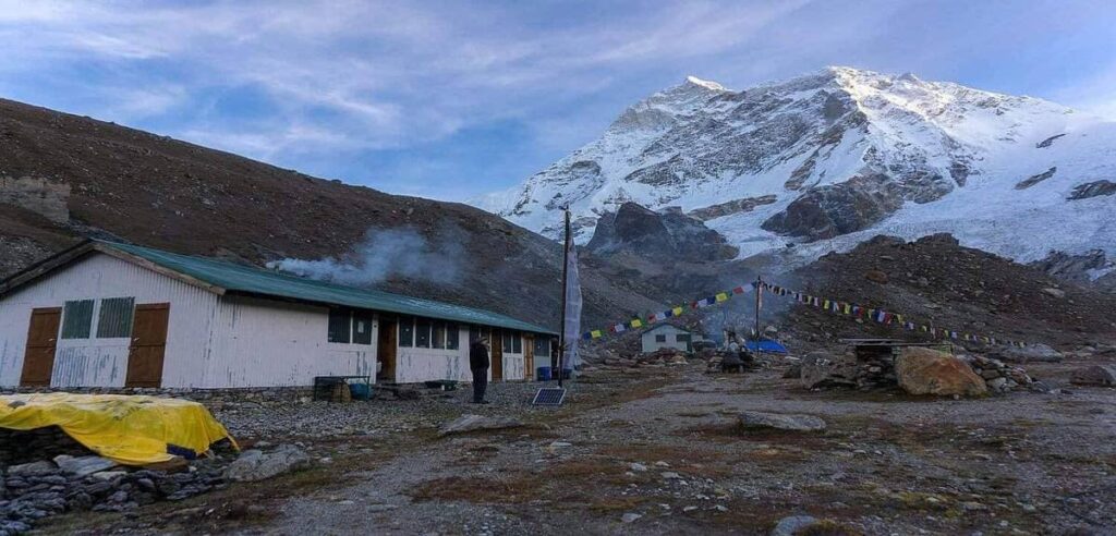 View of Makalu Base Camp surrounded by snowcapped peaks during a high-altitude trek in Nepal