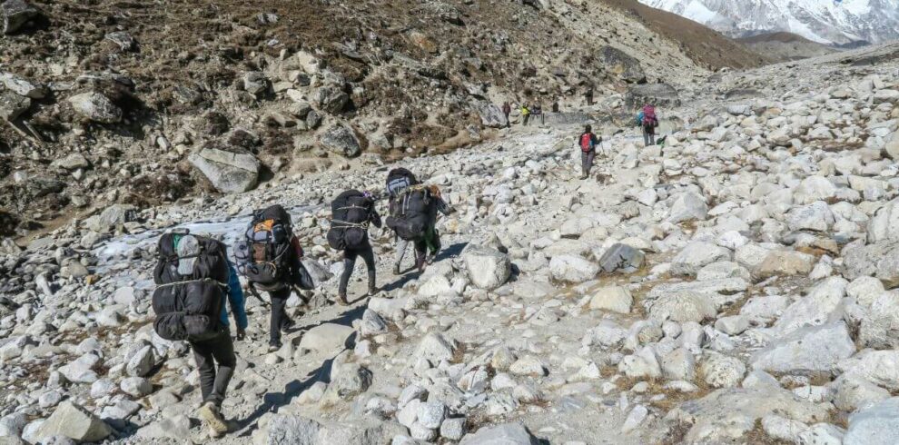 Sherpa Porters Trekking to Everest Base Camp.jpg